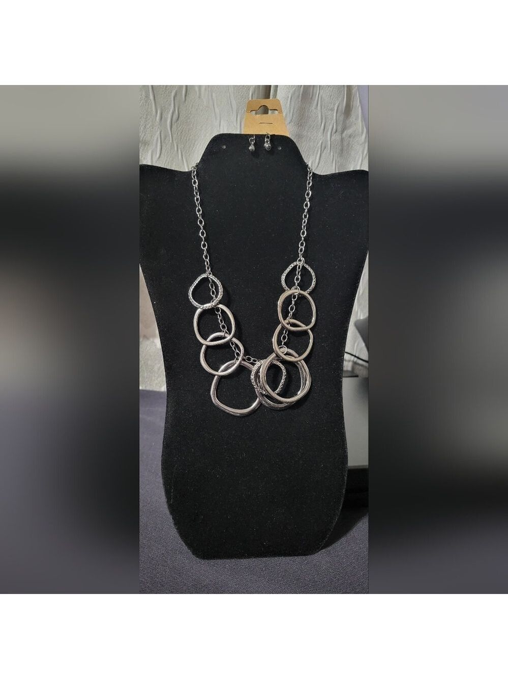 Modern Silver and Black Necklace with Interlocking Rings